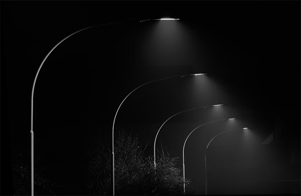 Dust accumulation over time reduces the quality of light from traditional light towers over streets