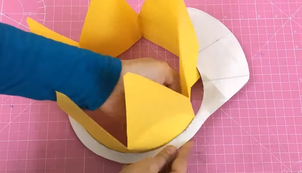 Making a paper construction worker’s hard hat