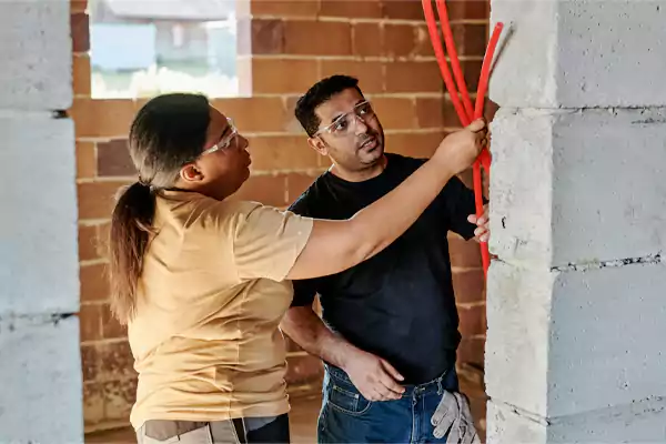 A General Contractor Checking the Quality of Work